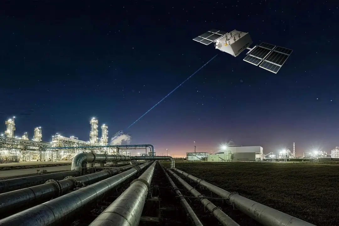 Pictures shows an illustration of a satellite connecting with a petrochemical plant